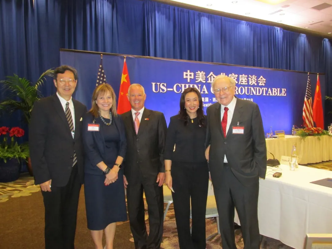 With Warren Buffett and General Motors CEO