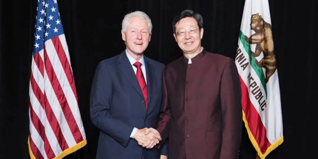 ACCS President Robert Sun with former President Bill Clinton
